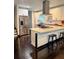 Bright kitchen with stainless steel appliances, island, and modern countertops at 657 S Grand Nw Ave, Atlanta, GA 30318