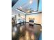 Spacious living area with a fireplace that seamlessly flows into the modern kitchen at 657 S Grand Nw Ave, Atlanta, GA 30318