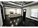 Open living area with fireplace, dark hardwood floors, and modern accents at 657 S Grand Nw Ave, Atlanta, GA 30318