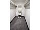 A walk-in closet featuring wire shelving, drawers, carpet, and storage at 657 S Grand Nw Ave, Atlanta, GA 30318