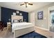 Comfortable bedroom featuring a comfortable bed, dresser, and modern decorations at 10 Tabor Trce, Oxford, GA 30054