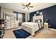 Comfortable bedroom featuring a comfortable bed, dresser, and modern decorations at 10 Tabor Trce, Oxford, GA 30054