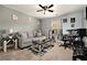 Cozy living room featuring a comfortable sofa, modern rug, and ambient lighting at 10 Tabor Trce, Oxford, GA 30054