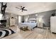 Spacious main bedroom with a tray ceiling, ceiling fan, and neutral decor at 10 Tabor Trce, Oxford, GA 30054