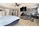 Spacious main bedroom with a seating area and an archway leading to the living room at 10 Tabor Trce, Oxford, GA 30054
