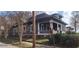 Charming two-story home with a covered porch and brick foundation in a residential neighborhood at 540 Langhorn Sw St, Atlanta, GA 30310