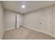 Cozy bedroom featuring neutral walls and carpet, offering a blank canvas ready for personalization at 805 Kilkenny Cir, Lithonia, GA 30058