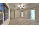 Large bedroom featuring plush carpet, a ceiling fan, and neutral paint at 805 Kilkenny Cir, Lithonia, GA 30058