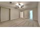 Large bedroom featuring plush carpet, a ceiling fan, and neutral paint at 805 Kilkenny Cir, Lithonia, GA 30058