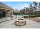 Community fire pit and pool, with a view of the surrounding foliage at 2499 Village Park Bend, Duluth, GA 30096