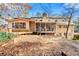 Back exterior view of the home, features a deck and a screened in porch at 2671 Lee Ann Dr, Marietta, GA 30066