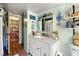 Bathroom with vanity, shelves, and decorative elements at 2671 Lee Ann Dr, Marietta, GA 30066