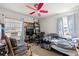 Bedroom featuring bed, chair, and windows at 2671 Lee Ann Dr, Marietta, GA 30066