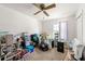 Bedroom with ceiling fan and double door closet at 2671 Lee Ann Dr, Marietta, GA 30066