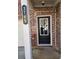 Close-up of the front door with glass insert and brick facade, displaying the house number at 3765 Davis Cir, Duluth, GA 30096