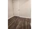 Unfurnished room featuring wood flooring and neutral walls at 3765 Davis Cir, Duluth, GA 30096