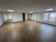 Spacious basement with wood-look floors, white walls, and recessed lighting offers flexible living space at 690 Antioch Rd, Powder Springs, GA 30127