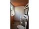Cozy bathroom features modern vanity, mirror, and decor at 690 Antioch Rd, Powder Springs, GA 30127