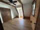 Bedroom featuring a ceiling fan, wood beams and hardwood floors at 690 Antioch Rd, Powder Springs, GA 30127