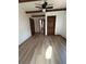 Bright bedroom with hardwood floors and natural light at 690 Antioch Rd, Powder Springs, GA 30127