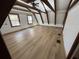 Spacious bedroom with a ceiling fan, wood beams and hardwood floors at 690 Antioch Rd, Powder Springs, GA 30127