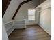 Bright closet space with custom shelving and a window overlooking the treeline at 690 Antioch Rd, Powder Springs, GA 30127
