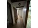 Hallway showcasing hardwood floors and decorative trim at 690 Antioch Rd, Powder Springs, GA 30127