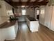 Fully equipped kitchen featuring granite countertops, stainless steel appliances, and a kitchen island at 690 Antioch Rd, Powder Springs, GA 30127