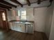 Kitchen with stainless steel appliances, granite countertops, and hardwood floors at 690 Antioch Rd, Powder Springs, GA 30127
