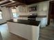 Kitchen with granite countertops, stainless steel appliances, and a kitchen island at 690 Antioch Rd, Powder Springs, GA 30127