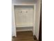 Organized mudroom entryway with a built-in bench and coat hooks at 690 Antioch Rd, Powder Springs, GA 30127