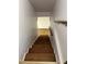 Staircase with wooden steps and handrails at 690 Antioch Rd, Powder Springs, GA 30127