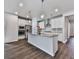 Bright kitchen featuring stainless steel appliances, granite countertops, and a spacious island at 3614 Arrow Root Cir, Loganville, GA 30052