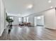 Bright and airy living room with hardwood floors and large windows at 3614 Arrow Root Cir, Loganville, GA 30052