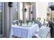 Outdoor dining area on a balcony with seating, garden decor, and a relaxing ambiance at 2525 Peachtree Ne Rd # 25, Atlanta, GA 30305