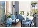 Charming outdoor balcony with seating, decorative plants, and a relaxing ambiance at 2525 Peachtree Ne Rd # 25, Atlanta, GA 30305