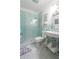 This well-lit bathroom includes a glass shower, modern fixtures, and elegant tile work at 2525 Peachtree Ne Rd # 25, Atlanta, GA 30305