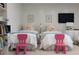 A charming ' bedroom features two twin beds, playful decor, and a cozy atmosphere at 2525 Peachtree Ne Rd # 25, Atlanta, GA 30305