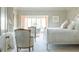 Serene bedroom with floral wallpaper, soft lighting, and refined furnishings at 2525 Peachtree Ne Rd # 25, Atlanta, GA 30305