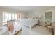 Inviting bedroom showcasing floral wallpaper, refined furniture, and soft natural light for a cozy retreat at 2525 Peachtree Ne Rd # 25, Atlanta, GA 30305