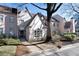 Charming traditional townhome featuring a manicured lawn and beautiful architectural details at 2525 Peachtree Ne Rd # 25, Atlanta, GA 30305