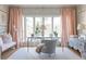 Bright home office featuring pink curtains, white walls, and desk at 2525 Peachtree Ne Rd # 25, Atlanta, GA 30305