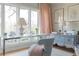 Bright home office featuring large windows, a sleek desk, and charming wallpaper at 2525 Peachtree Ne Rd # 25, Atlanta, GA 30305