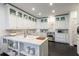 Bright kitchen with stainless steel appliances, custom cabinets, and marble countertops at 2525 Peachtree Ne Rd # 25, Atlanta, GA 30305