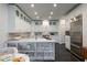 Bright kitchen with stainless steel appliances, custom cabinets, and marble countertops at 2525 Peachtree Ne Rd # 25, Atlanta, GA 30305