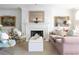 Classic living room featuring a fireplace, plush seating, and refined decor, creating a cozy atmosphere at 2525 Peachtree Ne Rd # 25, Atlanta, GA 30305
