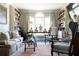 Inviting living room with bookshelves, a window seat, and a comfortable seating arrangement creates a relaxing atmosphere at 2525 Peachtree Ne Rd # 25, Atlanta, GA 30305