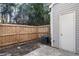 Backyard with a privacy fence and a door at 282 Devonshire Dr, Alpharetta, GA 30022