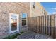 Backyard patio with fenced yard and brick exterior at 2989 Chene Pl, Duluth, GA 30097