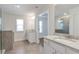 Bathroom features granite counters, double sink, and tiled floors for a spa-like experience at 2989 Chene Pl, Duluth, GA 30097